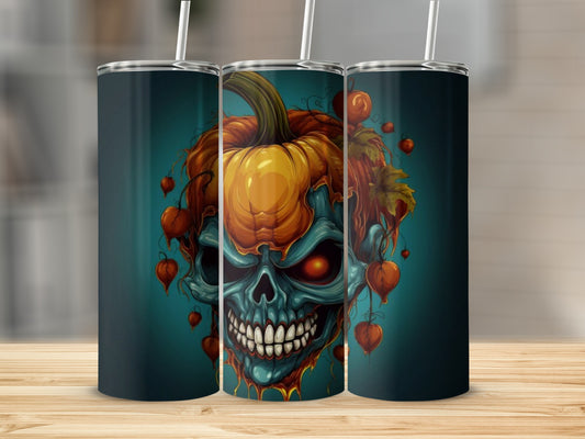Tumbler with a teal, pumpkin-headed skull design with red eyes and dangling orange fruit.