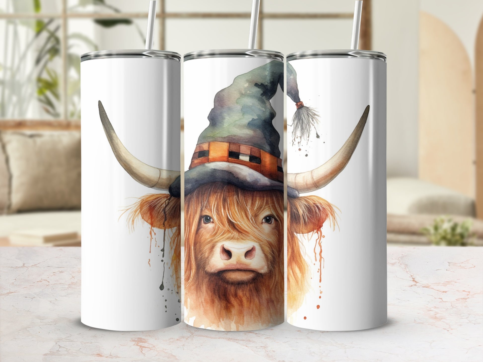 Highland cow in witch hat watercolor graphic on white tumbler.