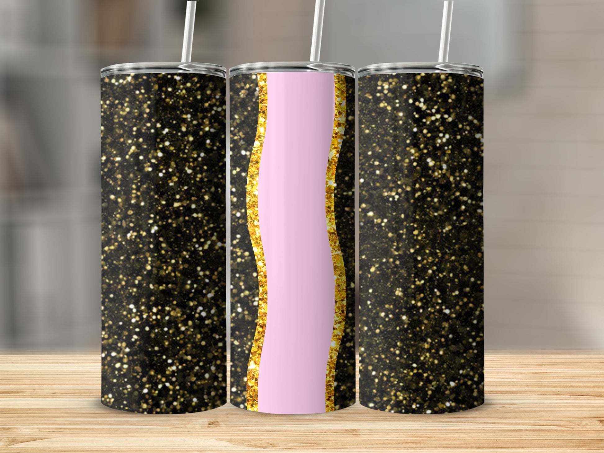 Black tumbler with gold glitter and pink wave design, featuring a straw.