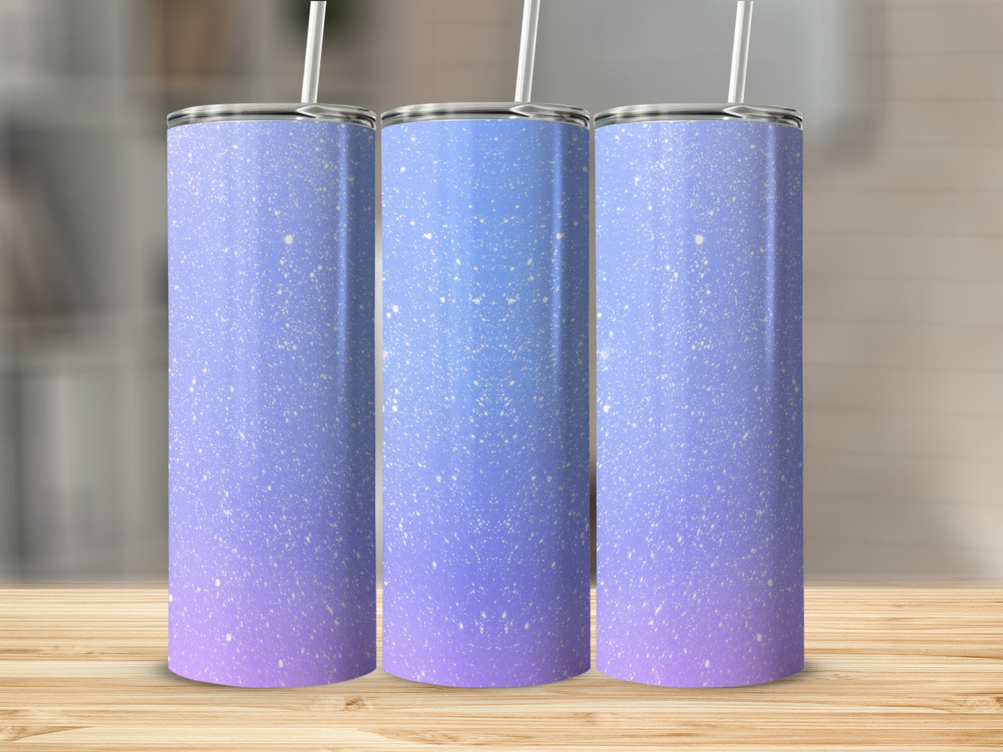 Three tall tumblers with a speckled purple and blue gradient design.