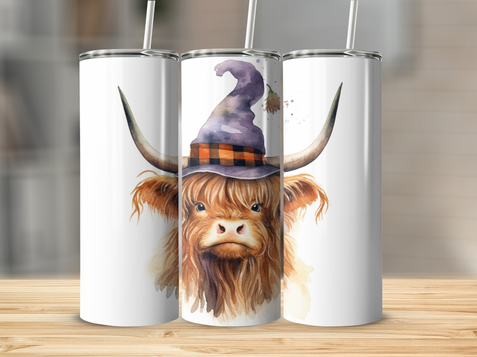 Highland cow wearing an orange and black plaid witch hat.