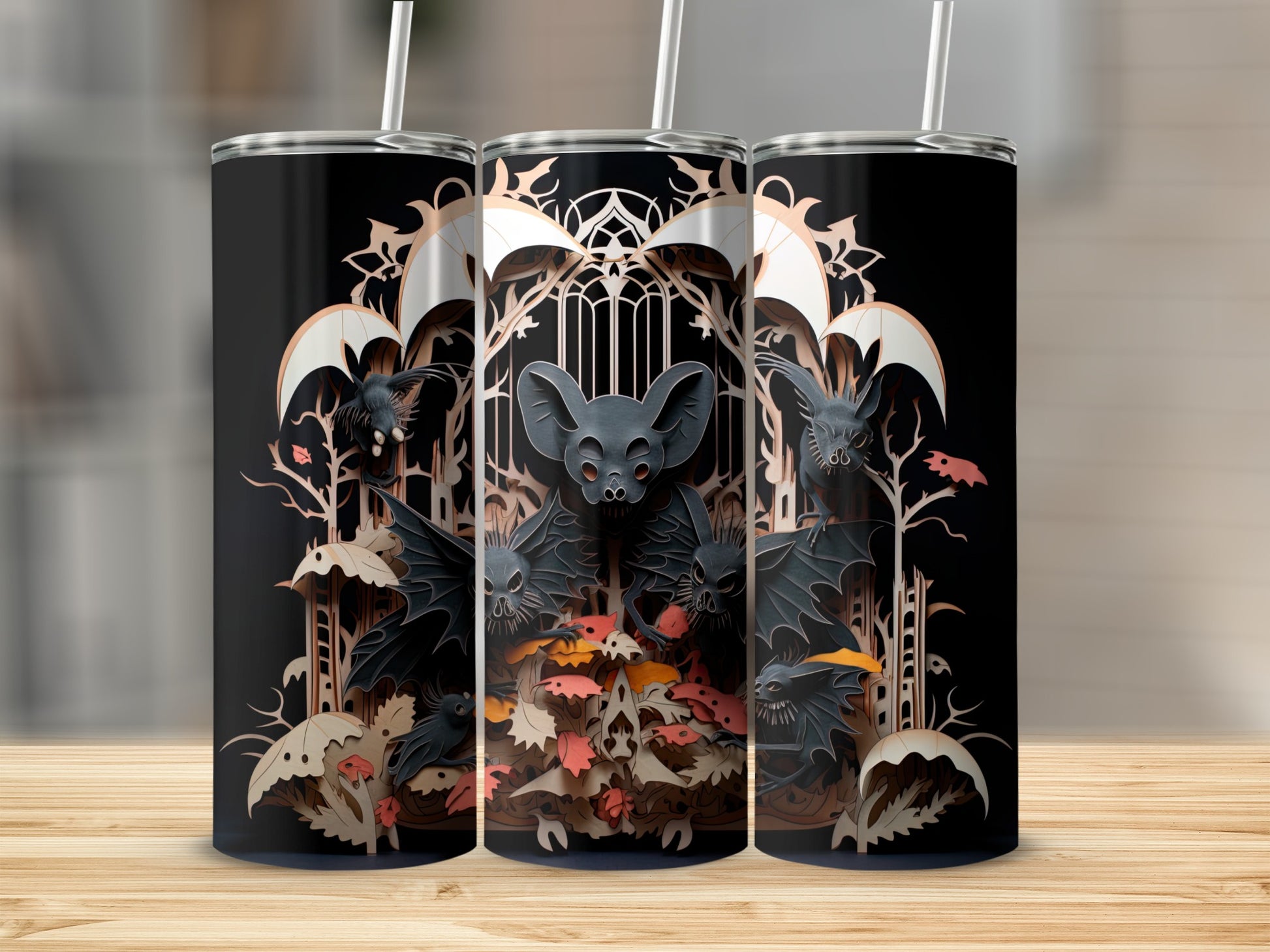 Tumbler with black background featuring gothic bats, trees, and ornate archways.