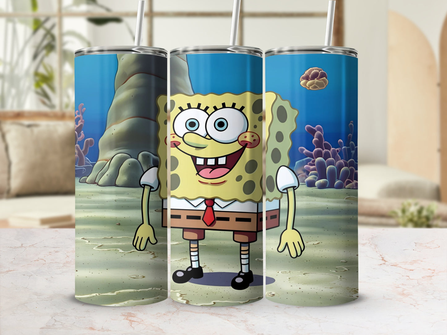 SpongeBob SquarePants tumbler with coral reef background.