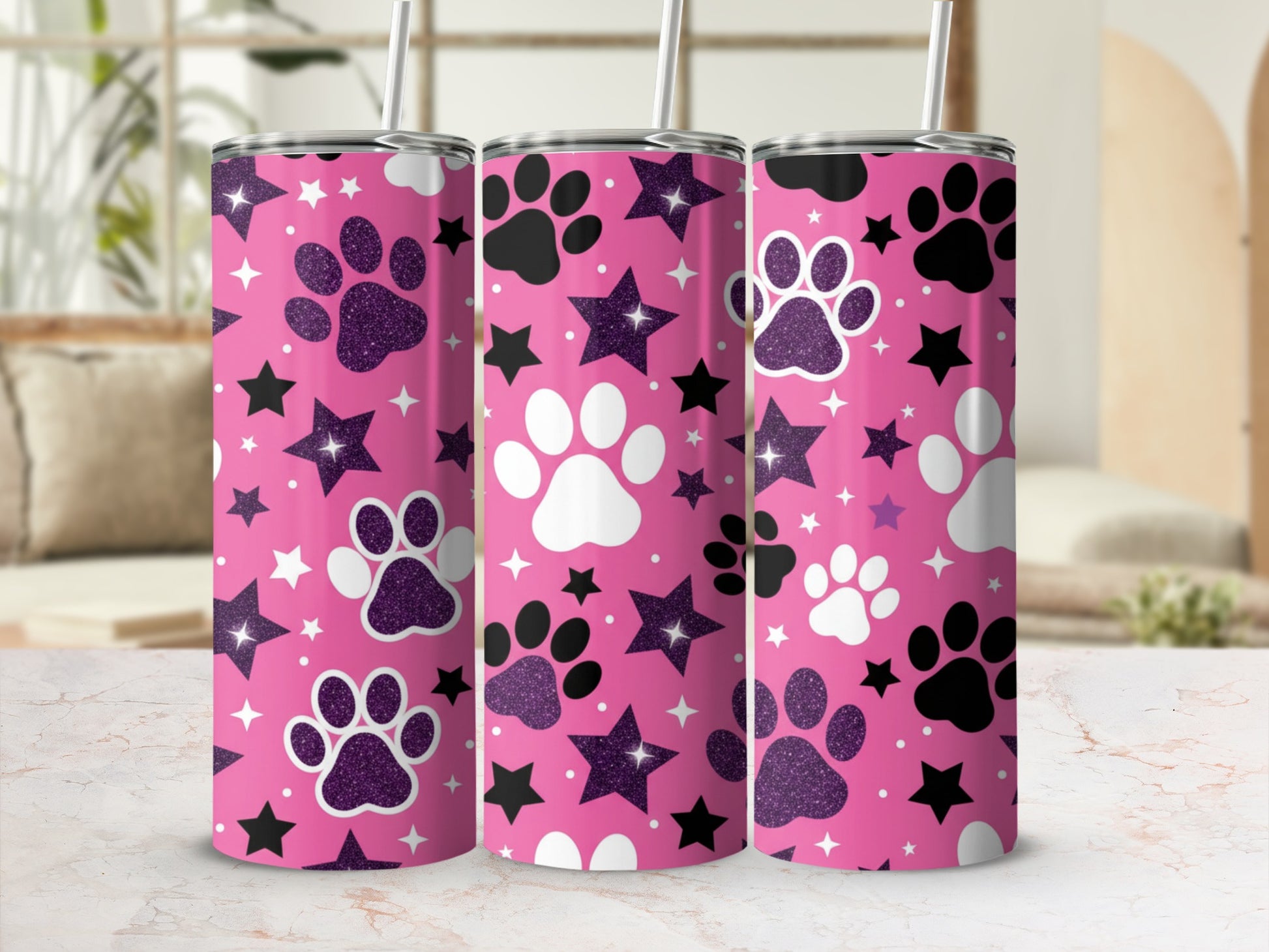 Pink glitter tumbler with paw prints and stars.