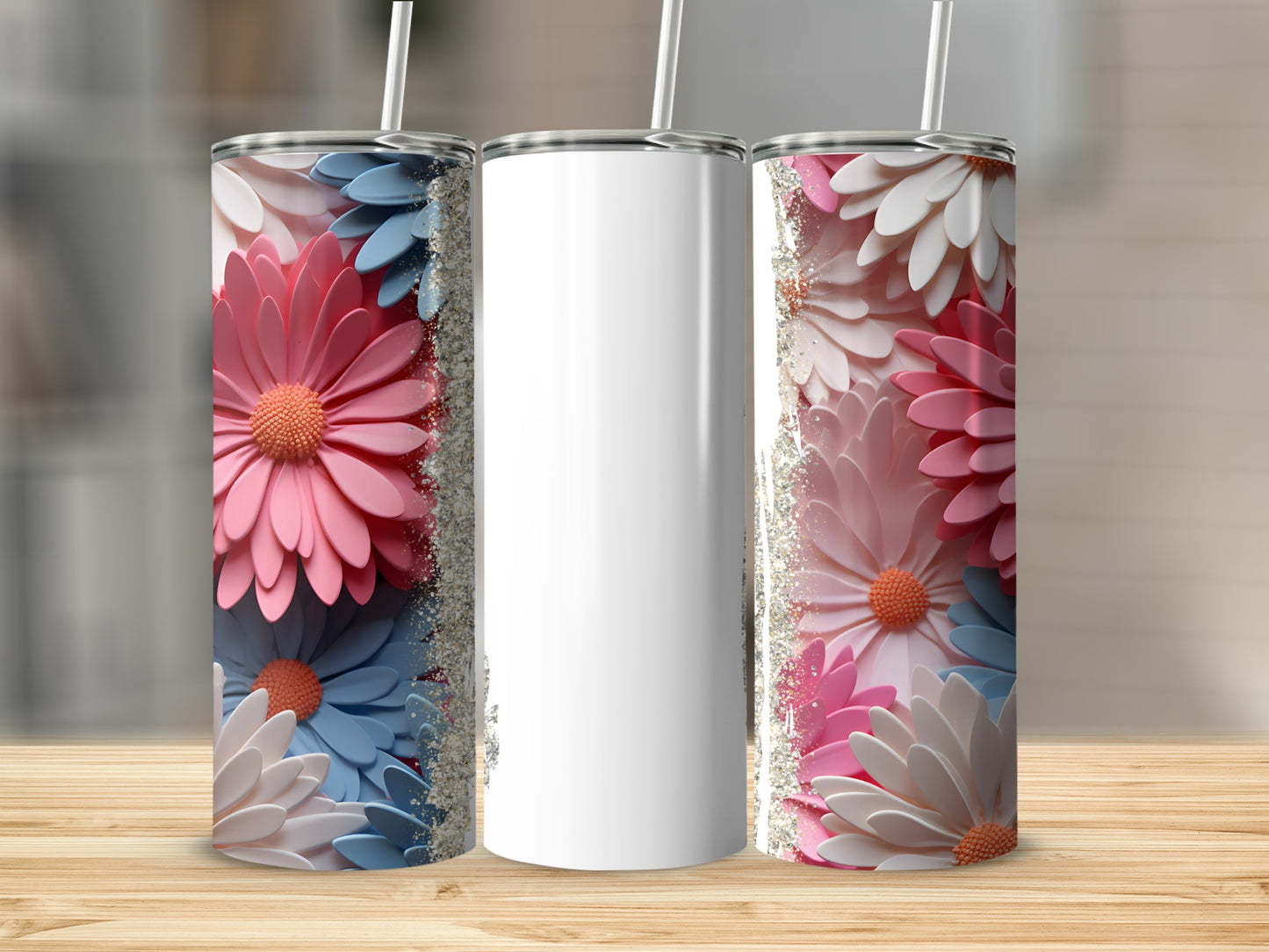 White tumbler with pink and blue flowers and glitter detail.