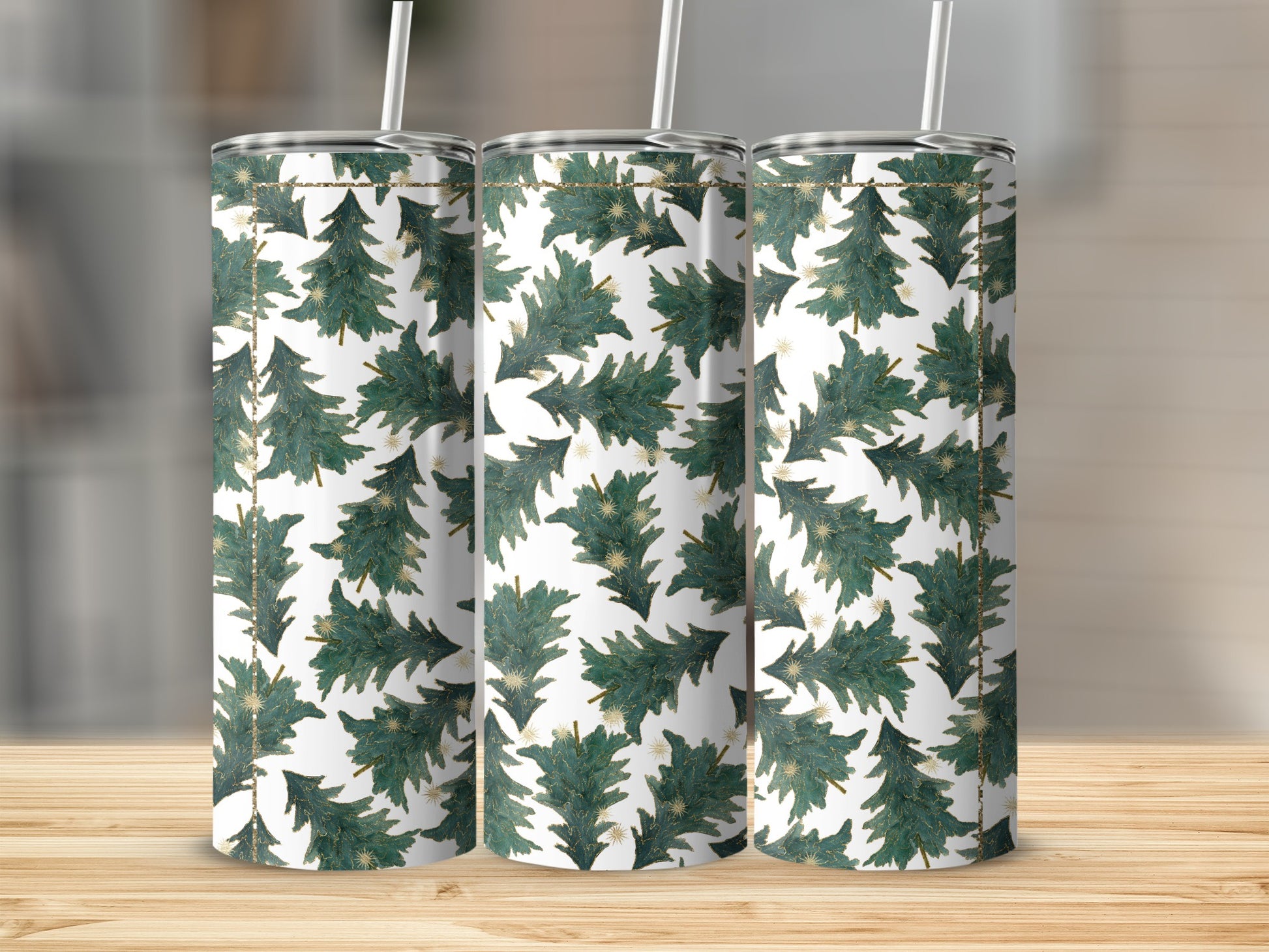 Three tumblers with a white background, green pine trees, and gold stars pattern.
