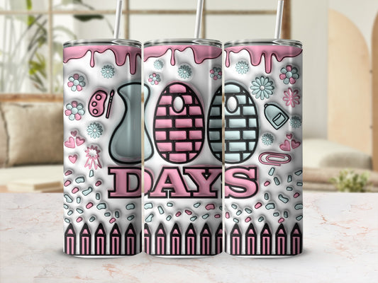 Pink and blue 100 Days tumbler with school supplies and floral pattern.