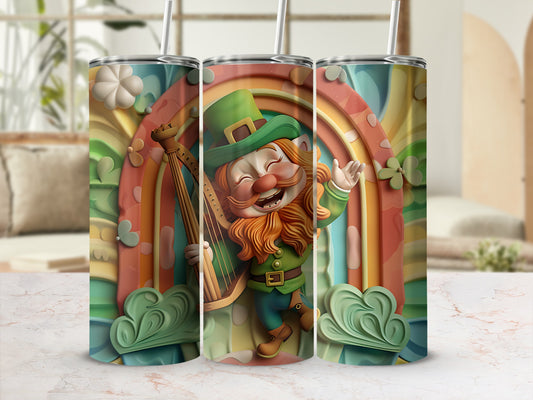 Leprechaun playing a harp with a rainbow and clouds on a tumbler.