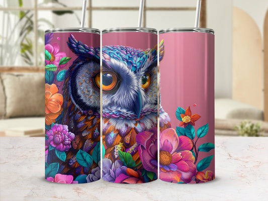 Owl with floral accents on a pink tumbler.