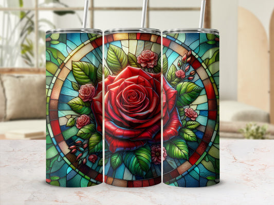 Stained glass tumbler with red rose design and green leaves.