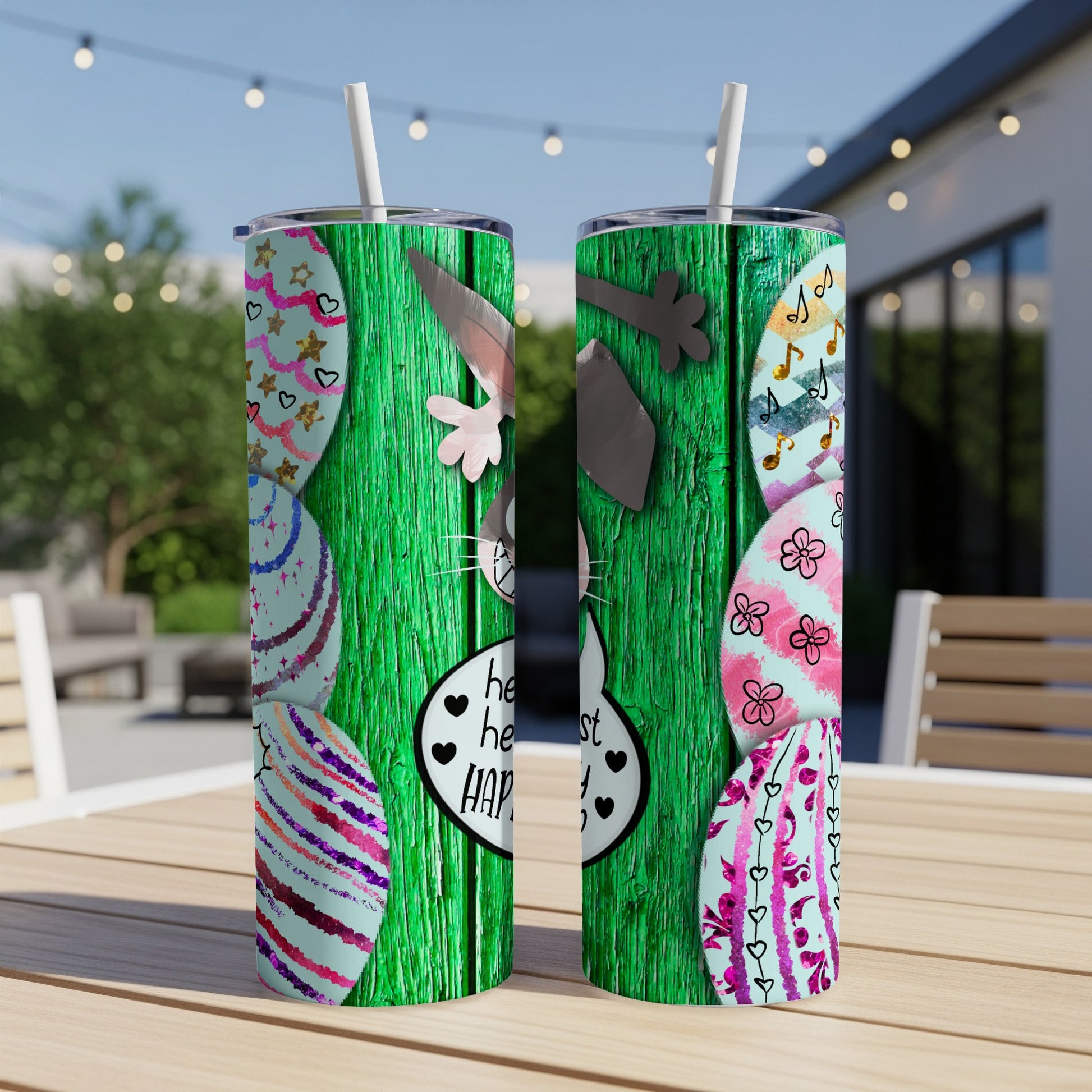 Easter bunny, eggs, and hearts on green wood grain skinny tumblers.