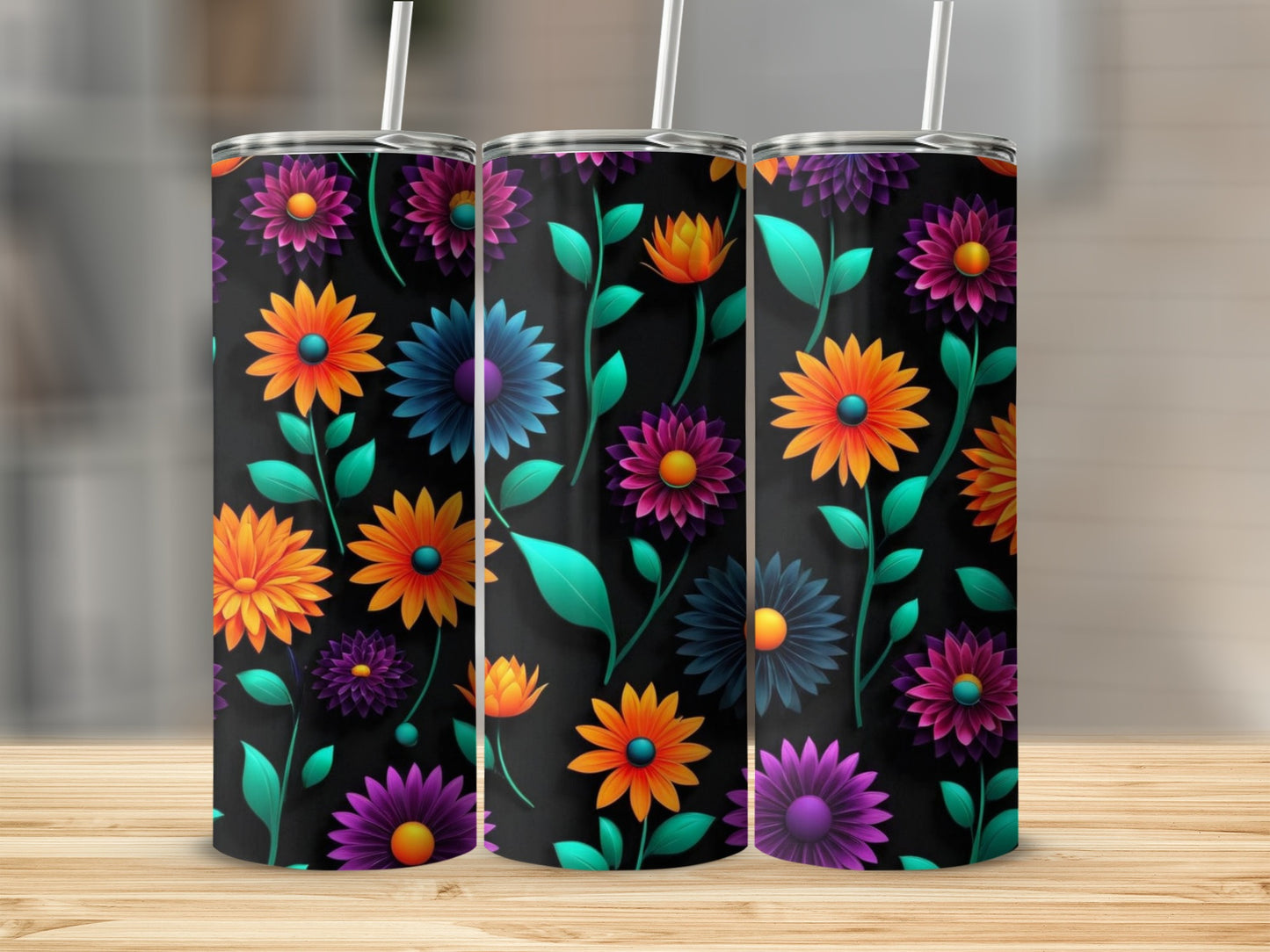 Three tumblers with a black background and vibrant floral patterns.