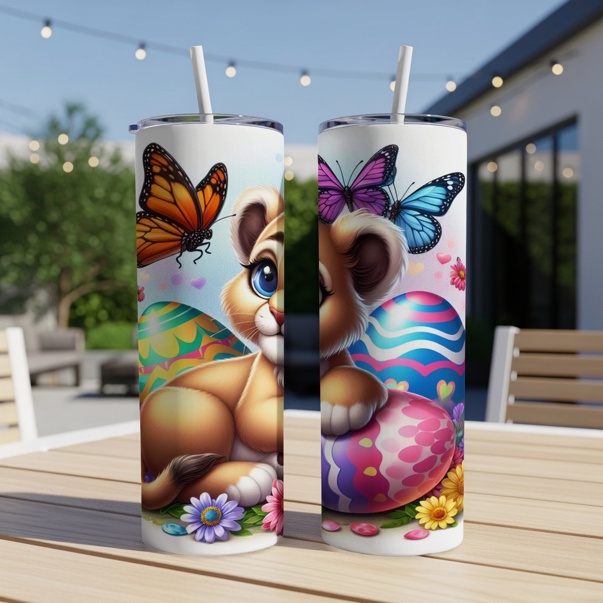 Lion cub with Easter eggs and butterflies on a tumbler.