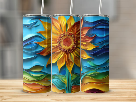 Sunflower design on three tall, insulated tumblers with straw on wooden surface.