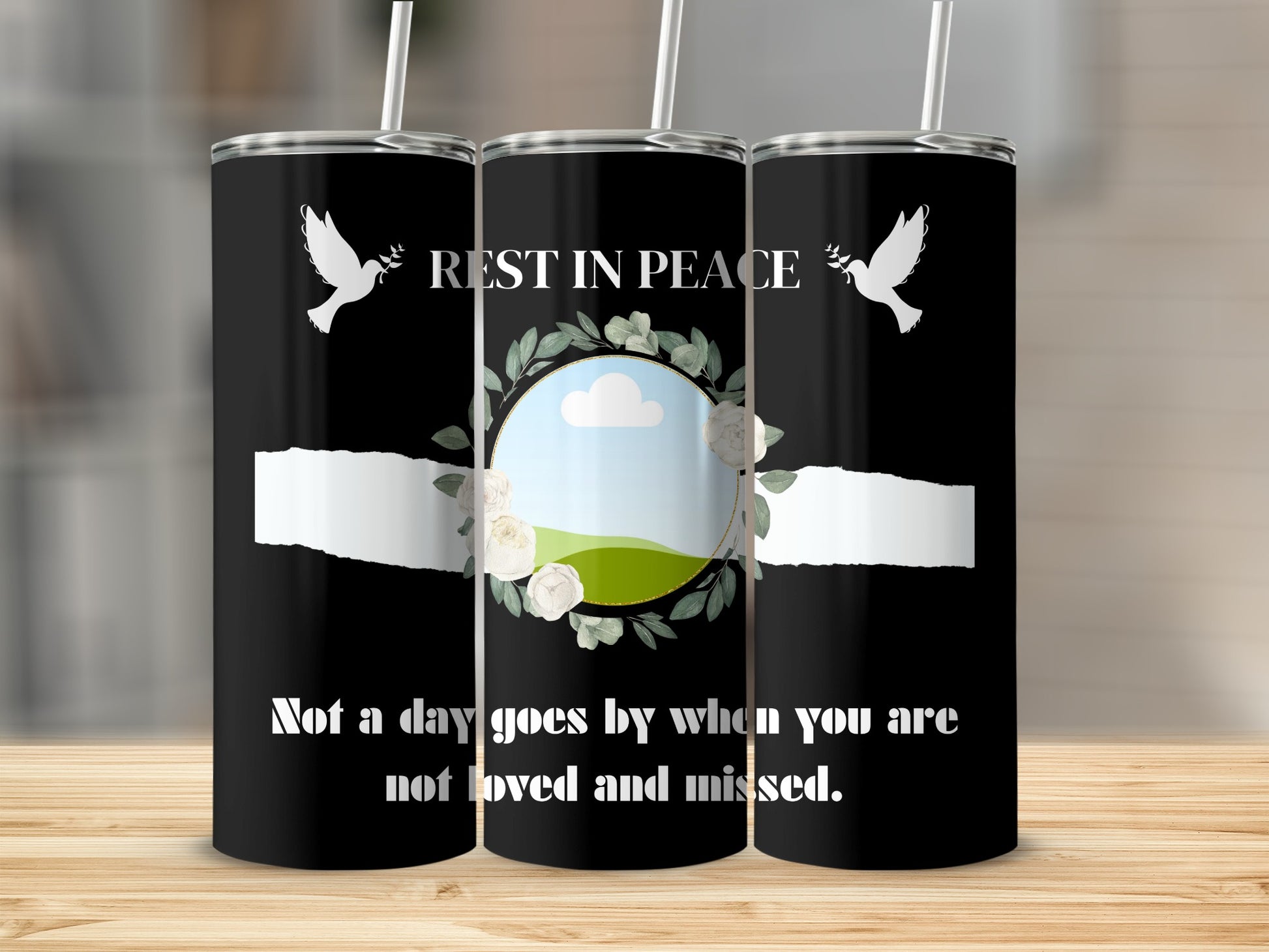 Rest in Peace tumbler with doves, floral wreath, and quote.
