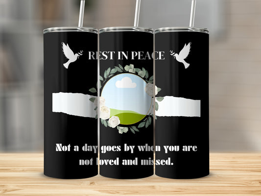 Rest in Peace tumbler with doves, floral wreath, and quote.