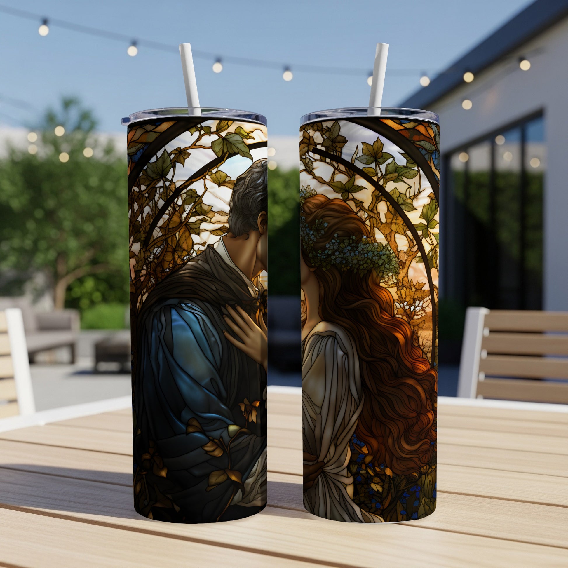 Two tumblers with stained glass art of a couple embracing.