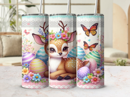 Easter tumbler with deer, colorful eggs, butterflies, and floral accents.