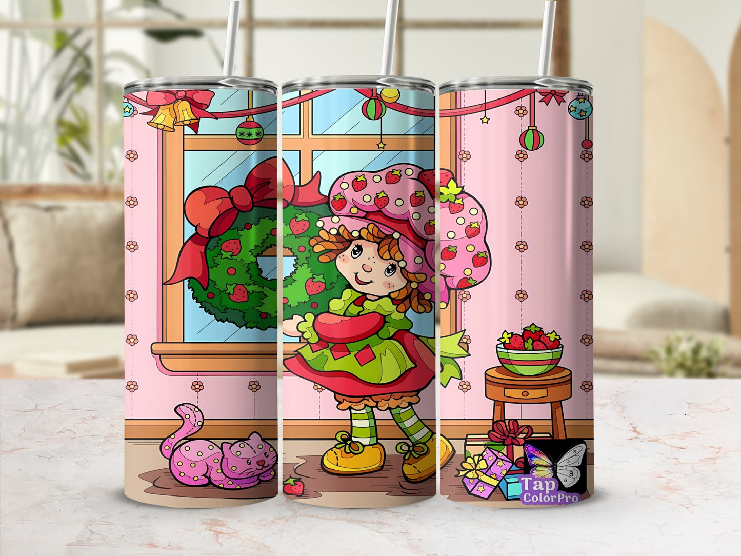 Strawberry Shortcake in festive attire holding a wreath with a cat and gifts.