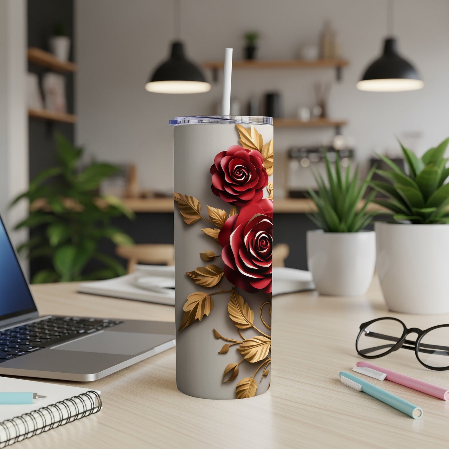 Silver tumbler with red roses and gold leaves design.