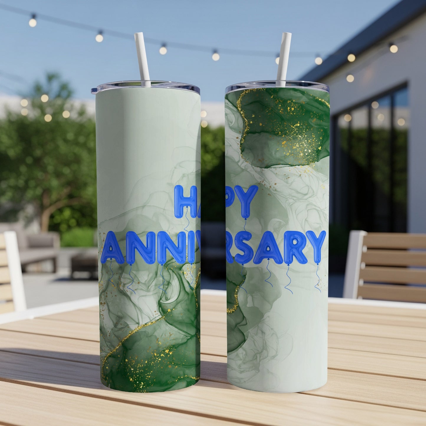 Two tumblers with blue "Happy Anniversary" text and green marbled design.