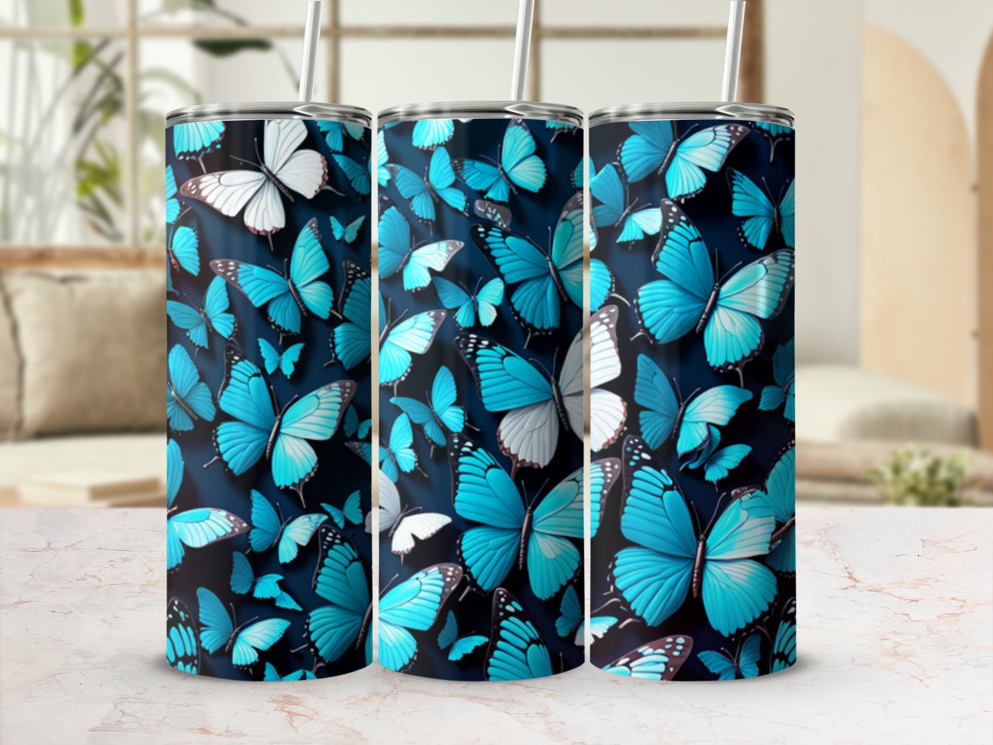 Blue butterflies on a dark background, pattern repeats across three tumblers.