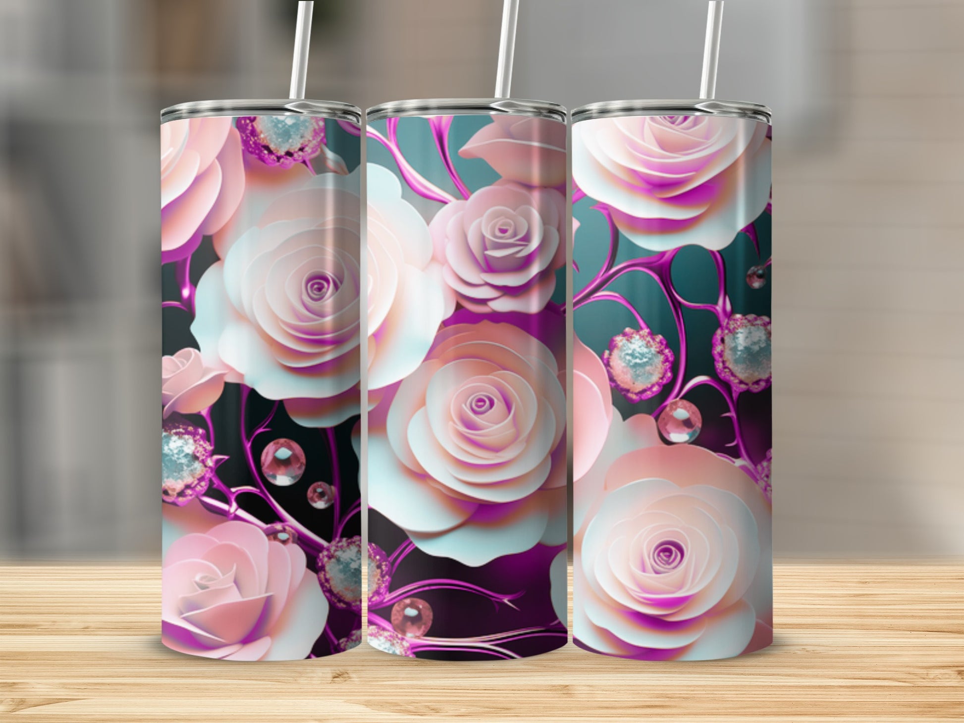 Three tumblers with a floral rose and jewel design.