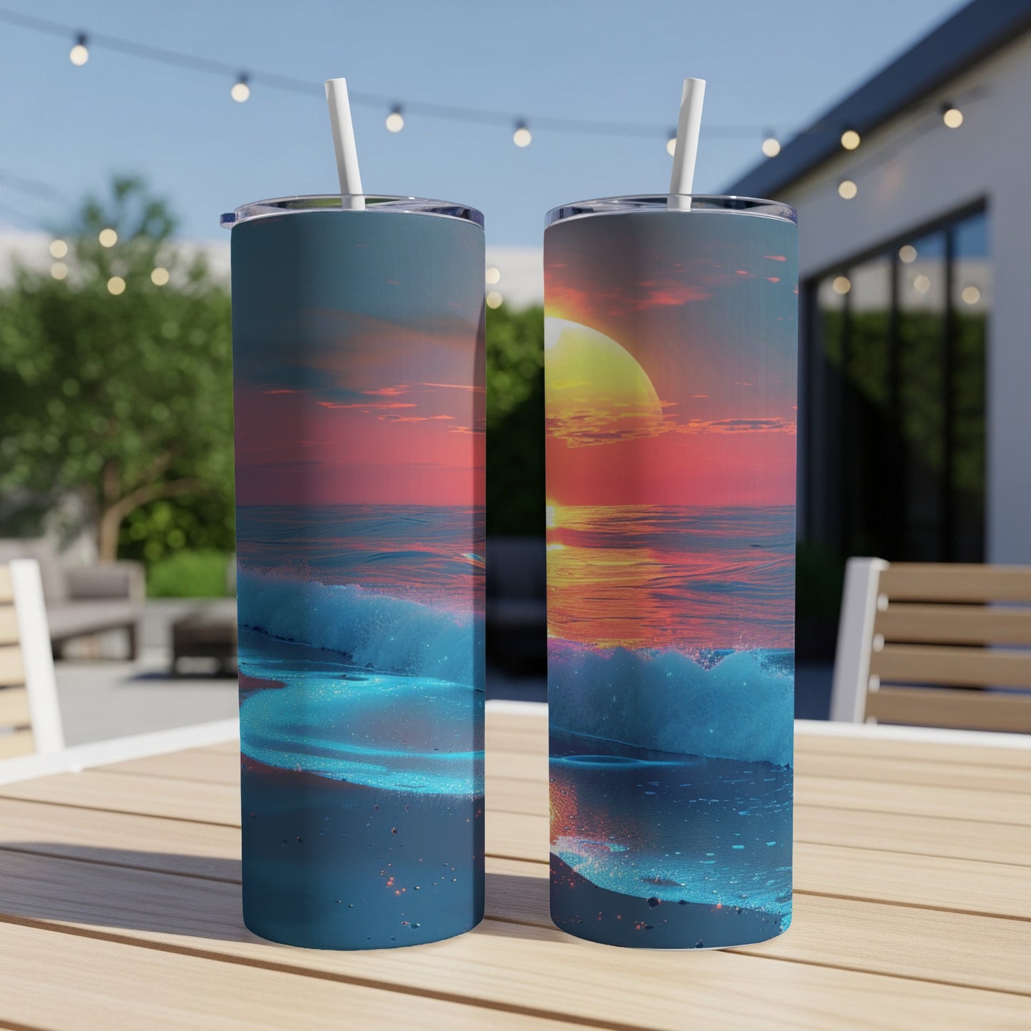 Two tumblers featuring a vibrant sunset over ocean waves.
