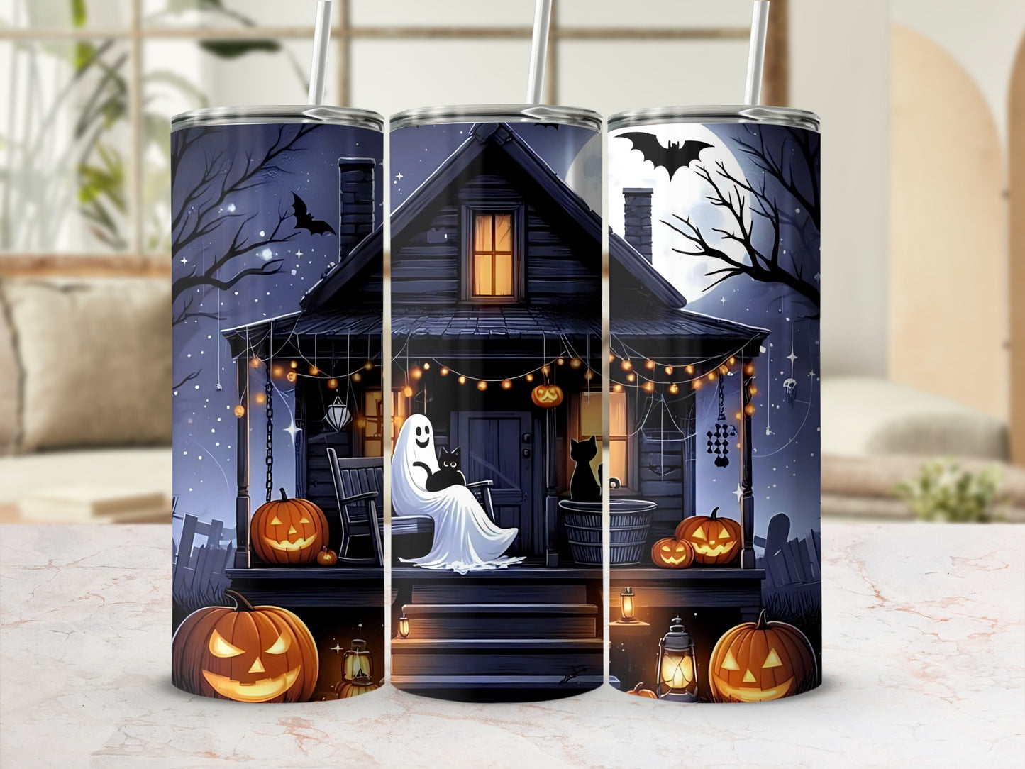 Halloween tumbler with ghost, black cats, pumpkins, and a spooky house scene.