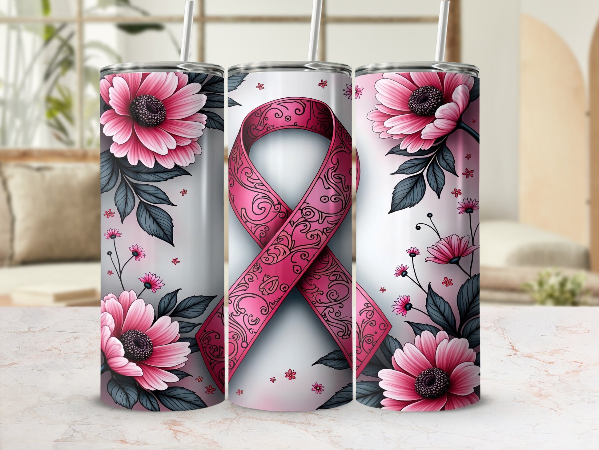 Pink ribbon with floral pattern on a white tumbler, with pink flowers.