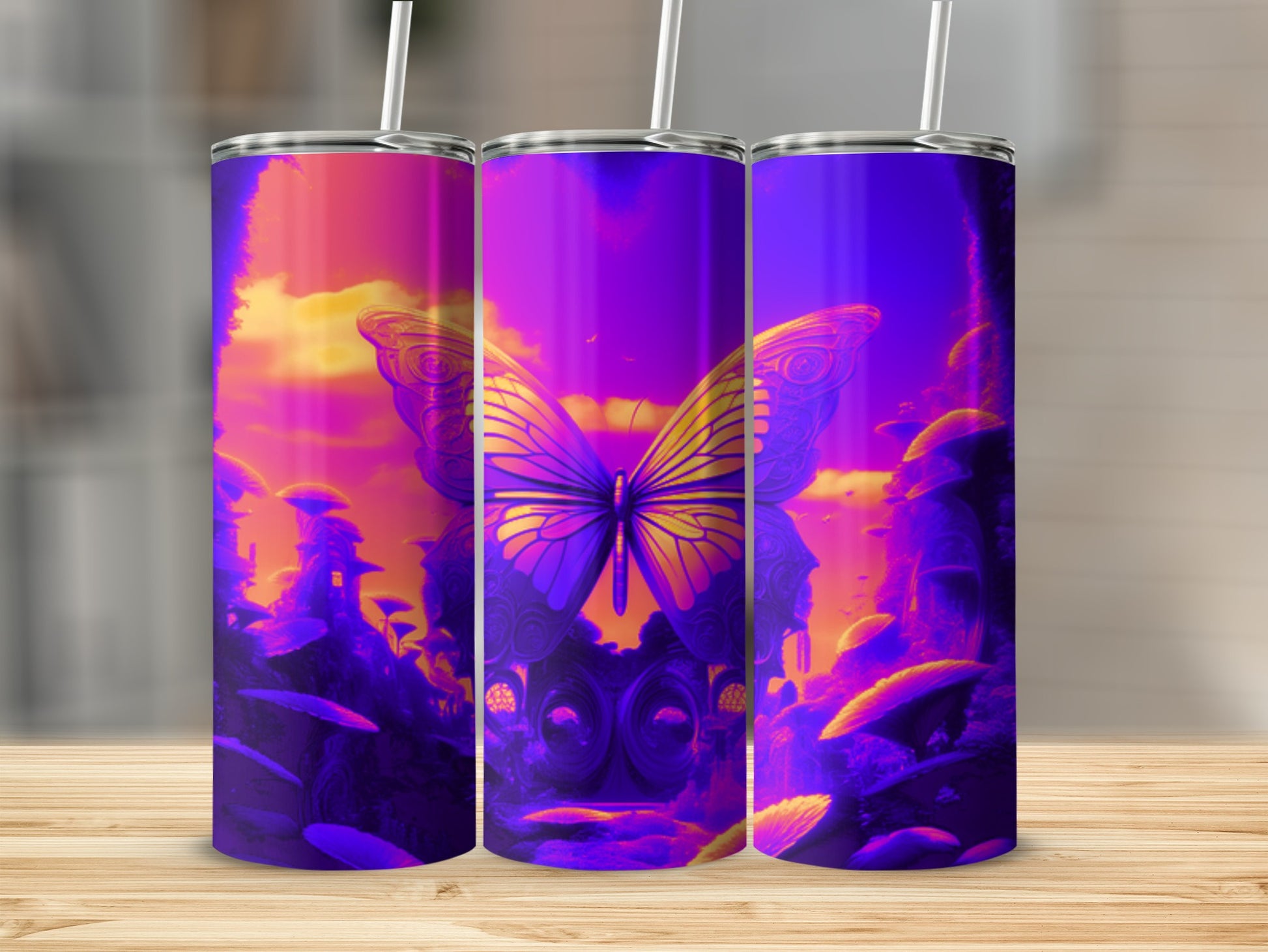 Three tumblers with a surreal butterfly and mushroom landscape design.