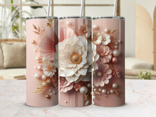 Pink floral tumbler with a straw, featuring embossed flowers and pearls.