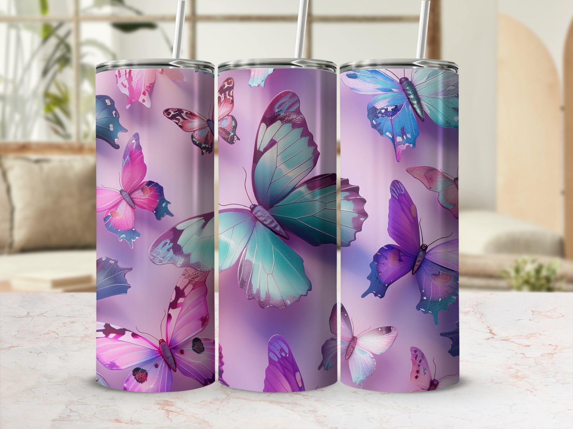 Three tumblers with iridescent butterfly designs in shades of pink and purple.