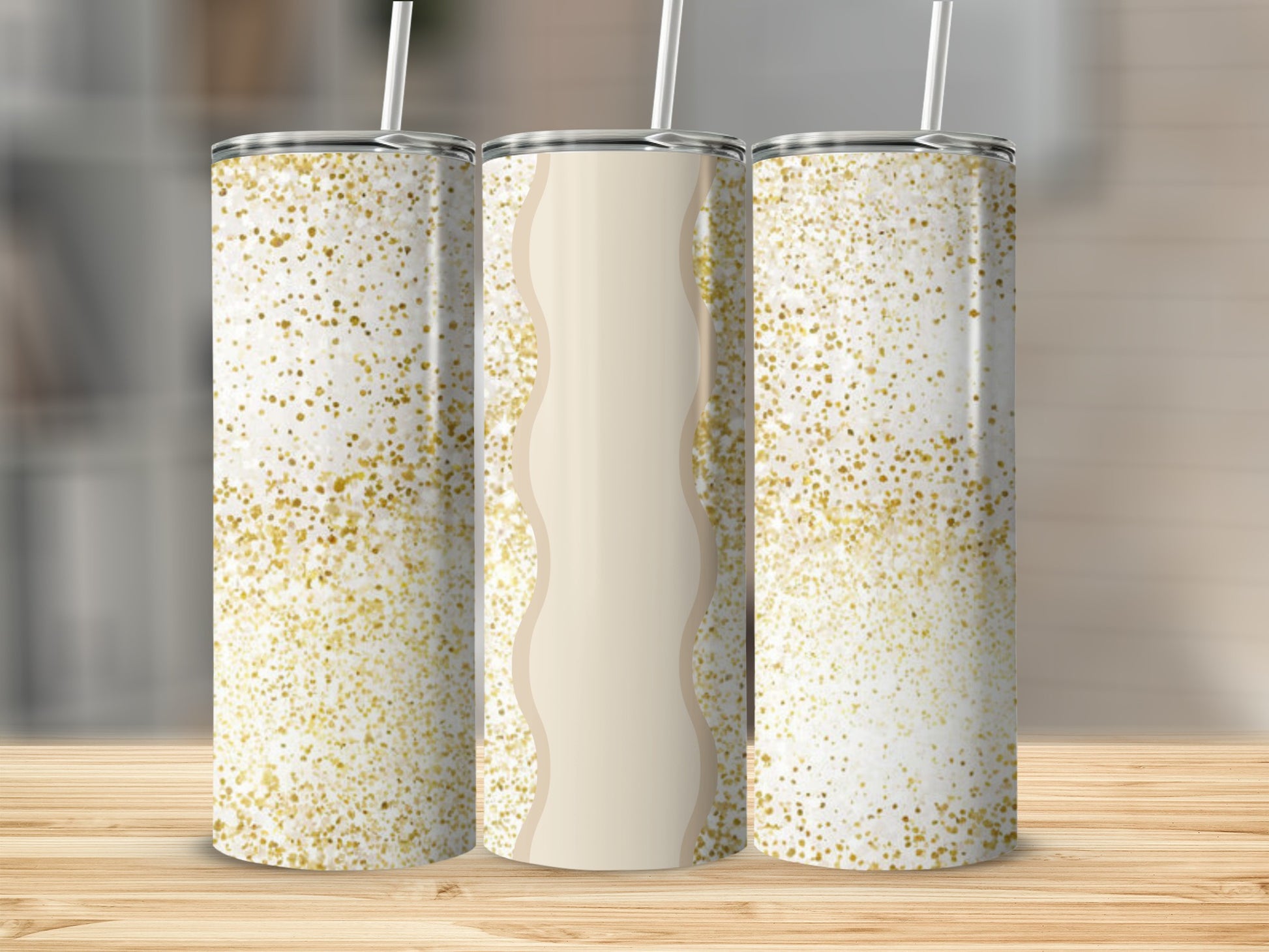 Three tumblers with gold glitter and beige wavy detail.