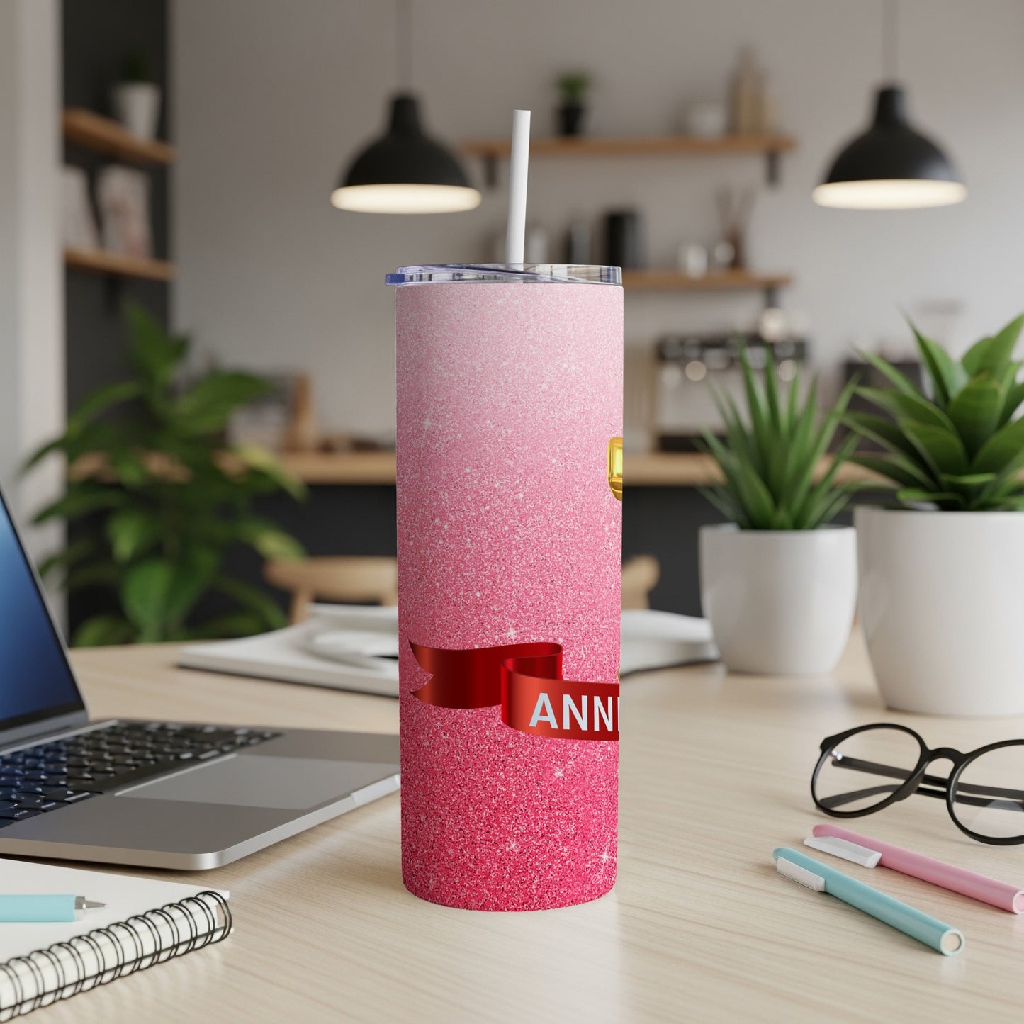 Glittery pink tumbler with gold "50" and red "ANNIVERSARY" ribbon.
