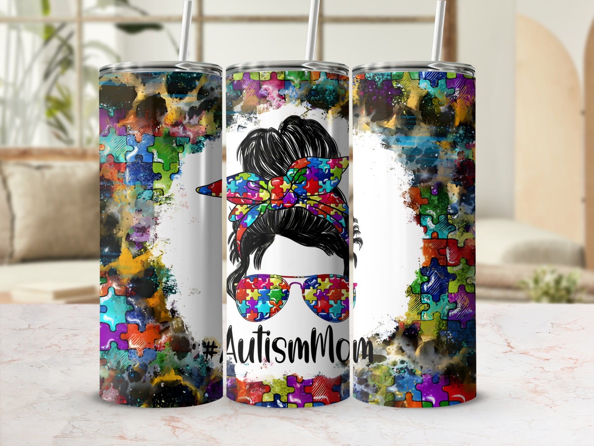 Autism Mom tumbler with colorful puzzle pieces and messy bun woman graphic.