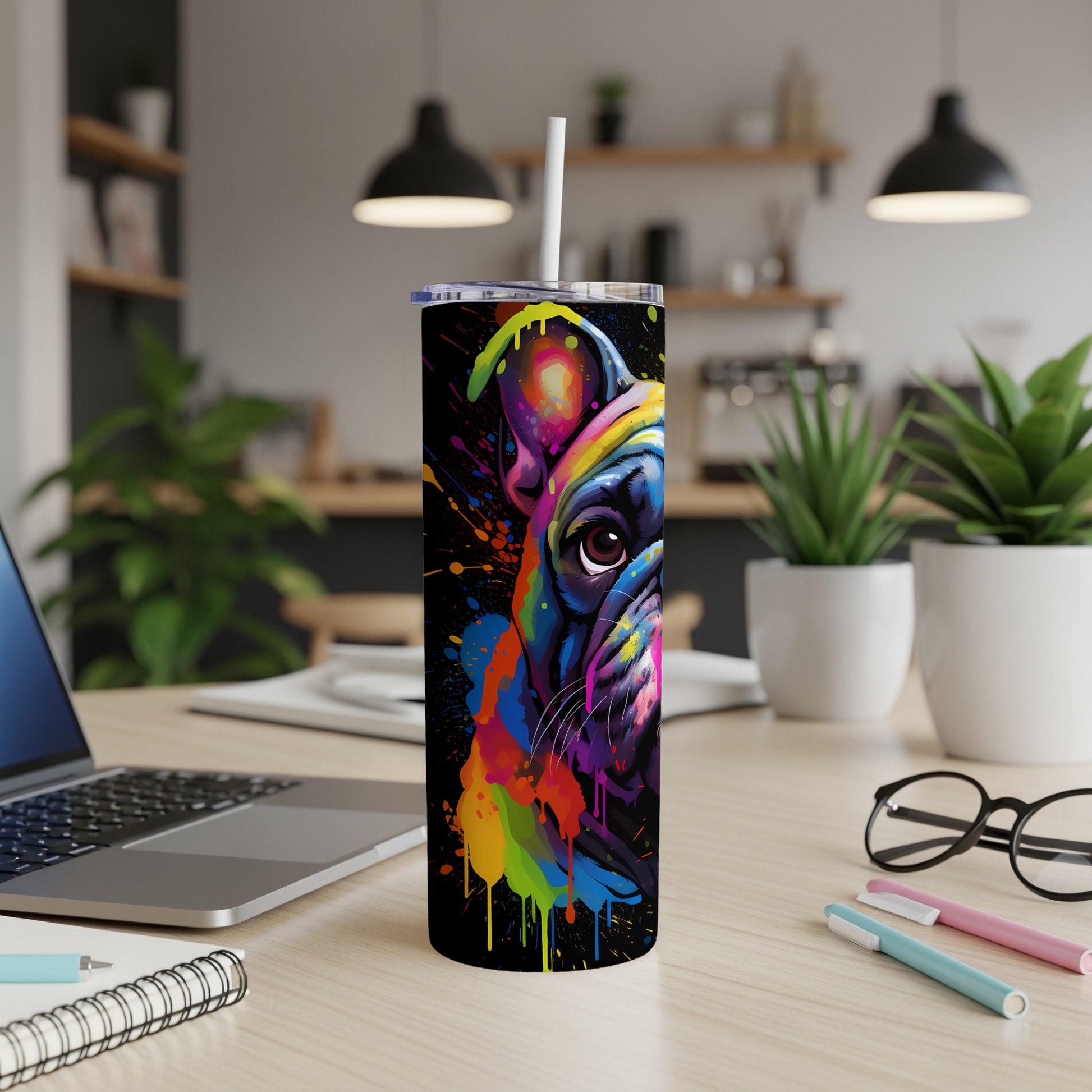 French bulldog face painted with colorful abstract splatters on a black tumbler.
