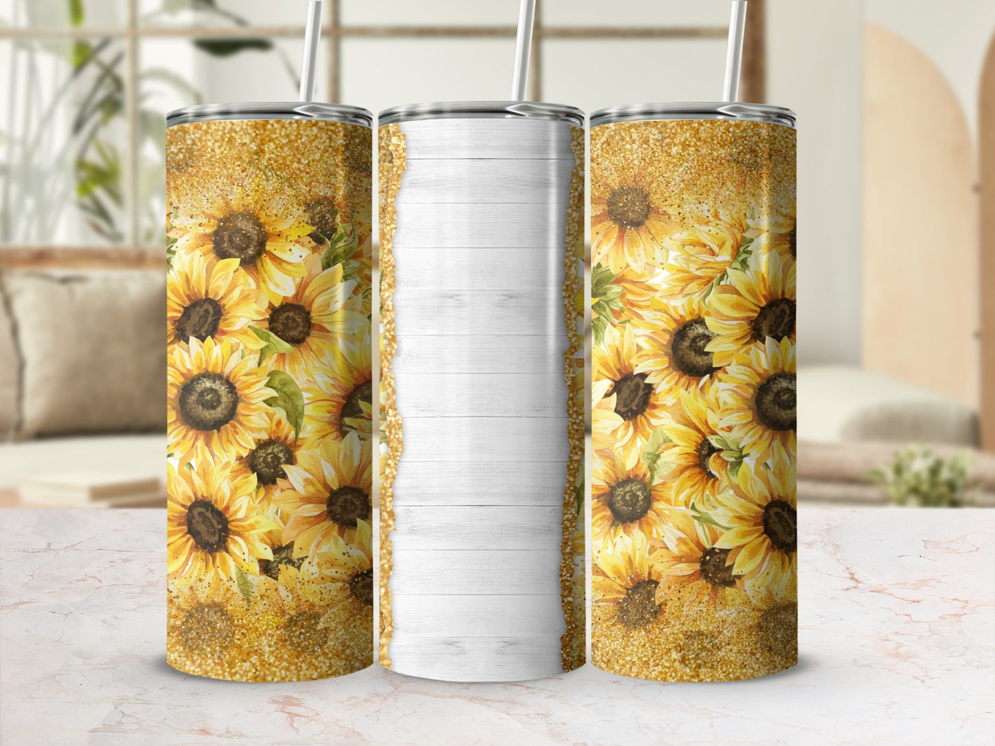 Three sunflowers on a textured tumbler with a glittery top.