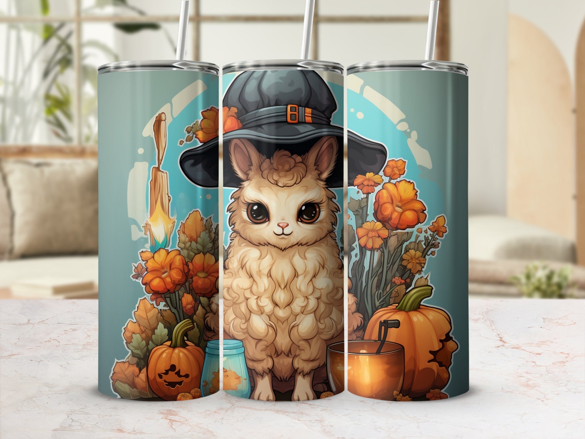 Tumbler with fluffy cat wearing witch hat, surrounded by pumpkins and flowers.