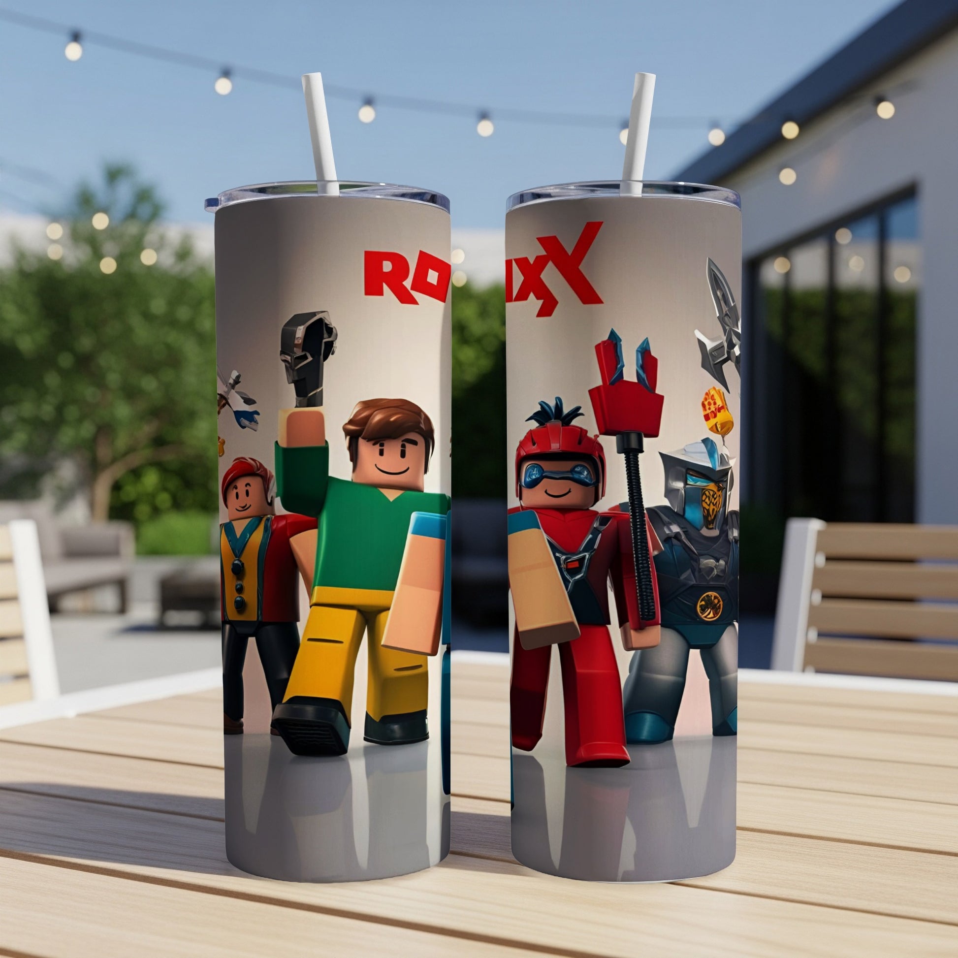 Two Roblox character tumblers with straws sit on a table.