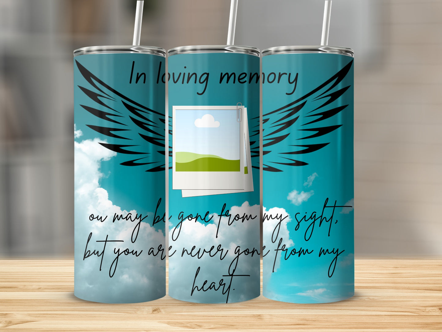 Tumblers with "In loving memory" text, angel wings, and quote about remembrance.