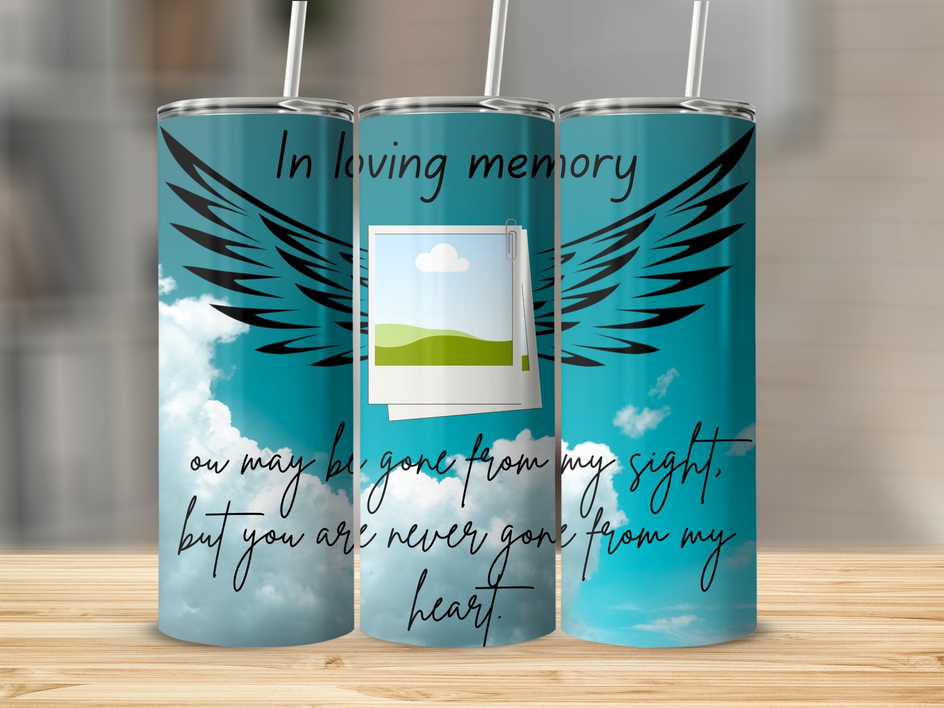 Tumblers with "In loving memory" text, angel wings, and quote about remembrance.