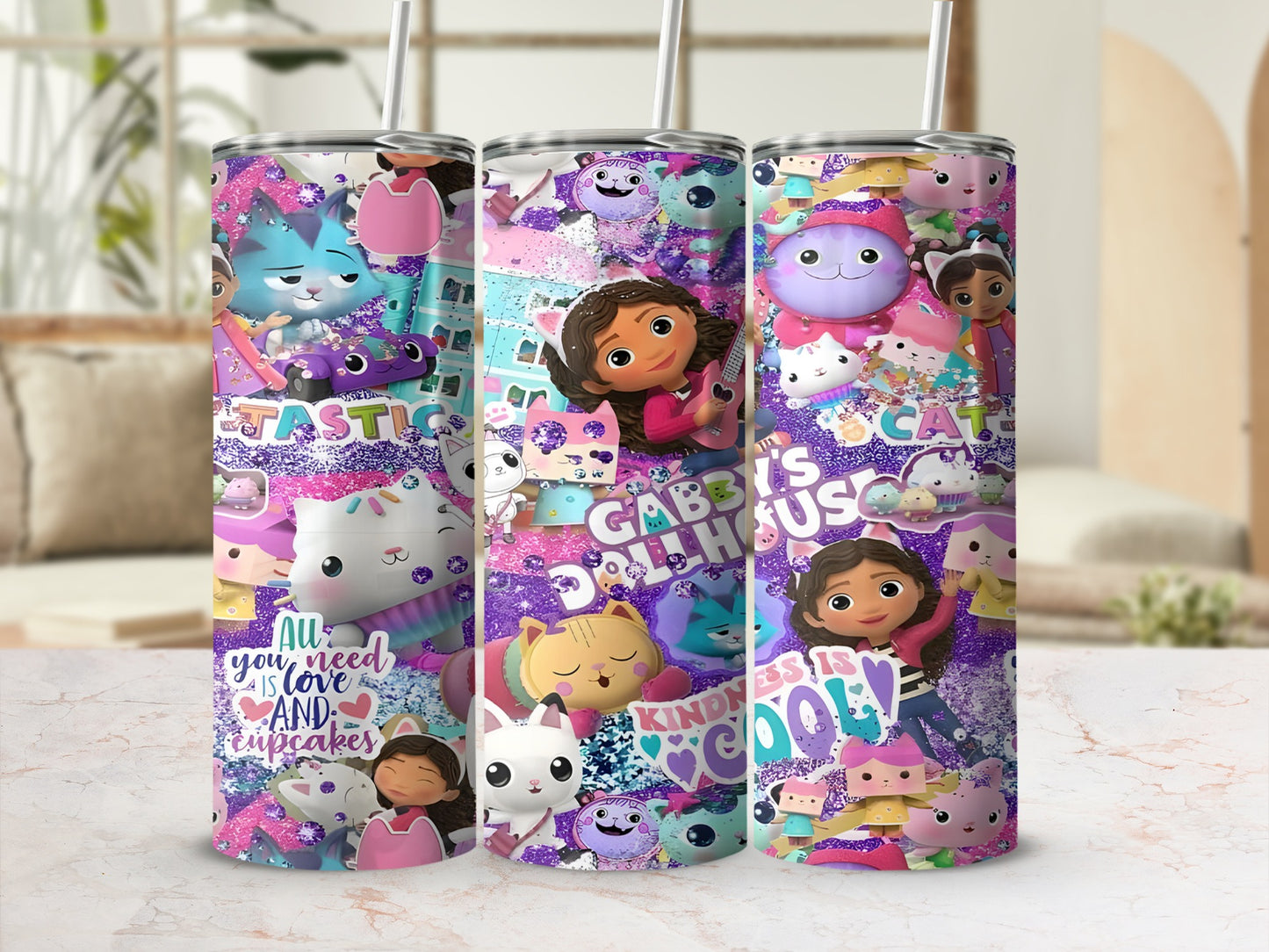 Gabby's Dollhouse characters on a colorful glittery tumbler with straws.