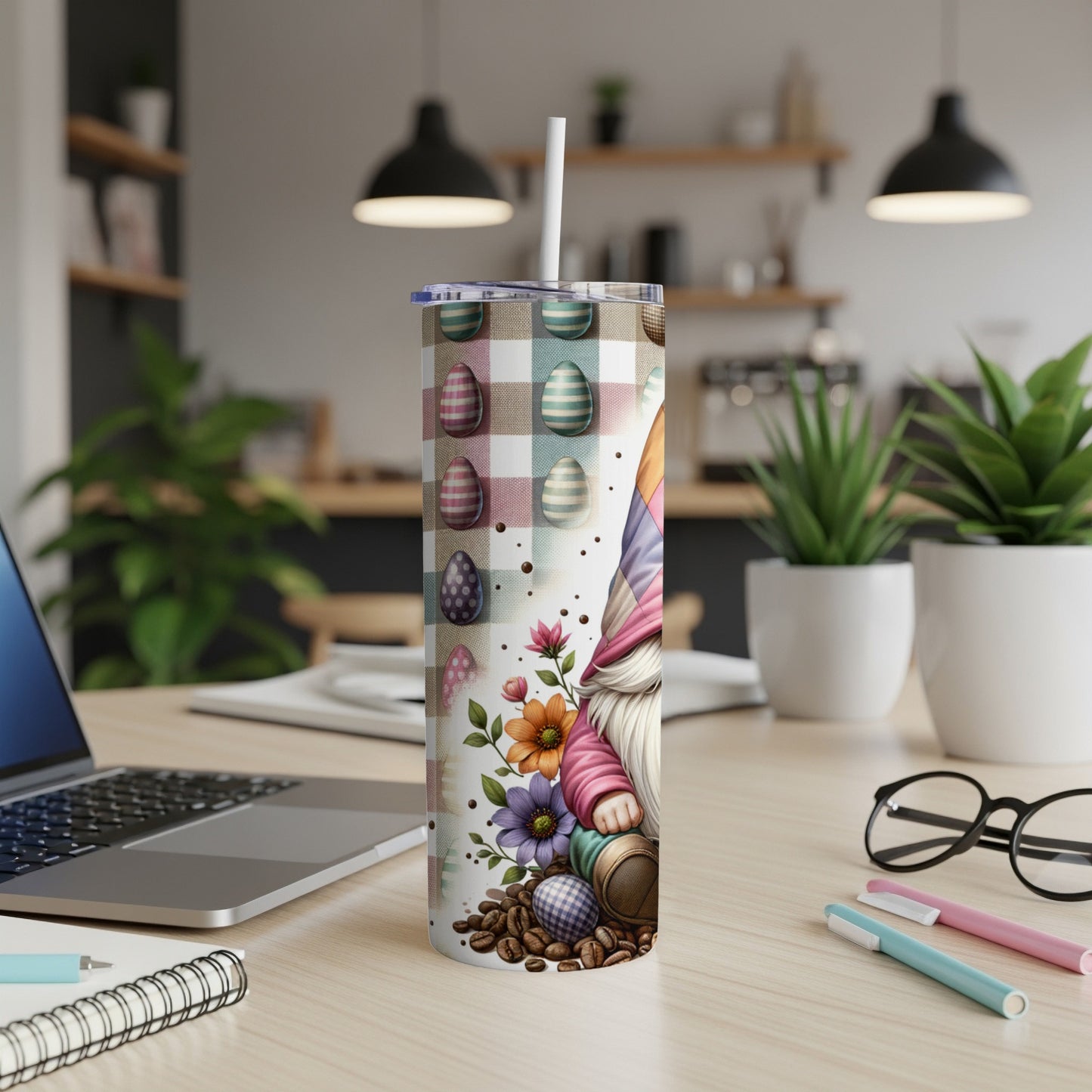 Gnome with Easter eggs and flowers on a patterned tumbler.