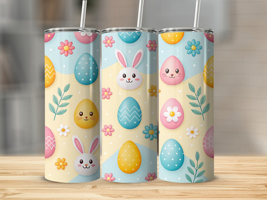 Easter themed tumblers with bunnies, eggs, and flowers on a wooden surface.