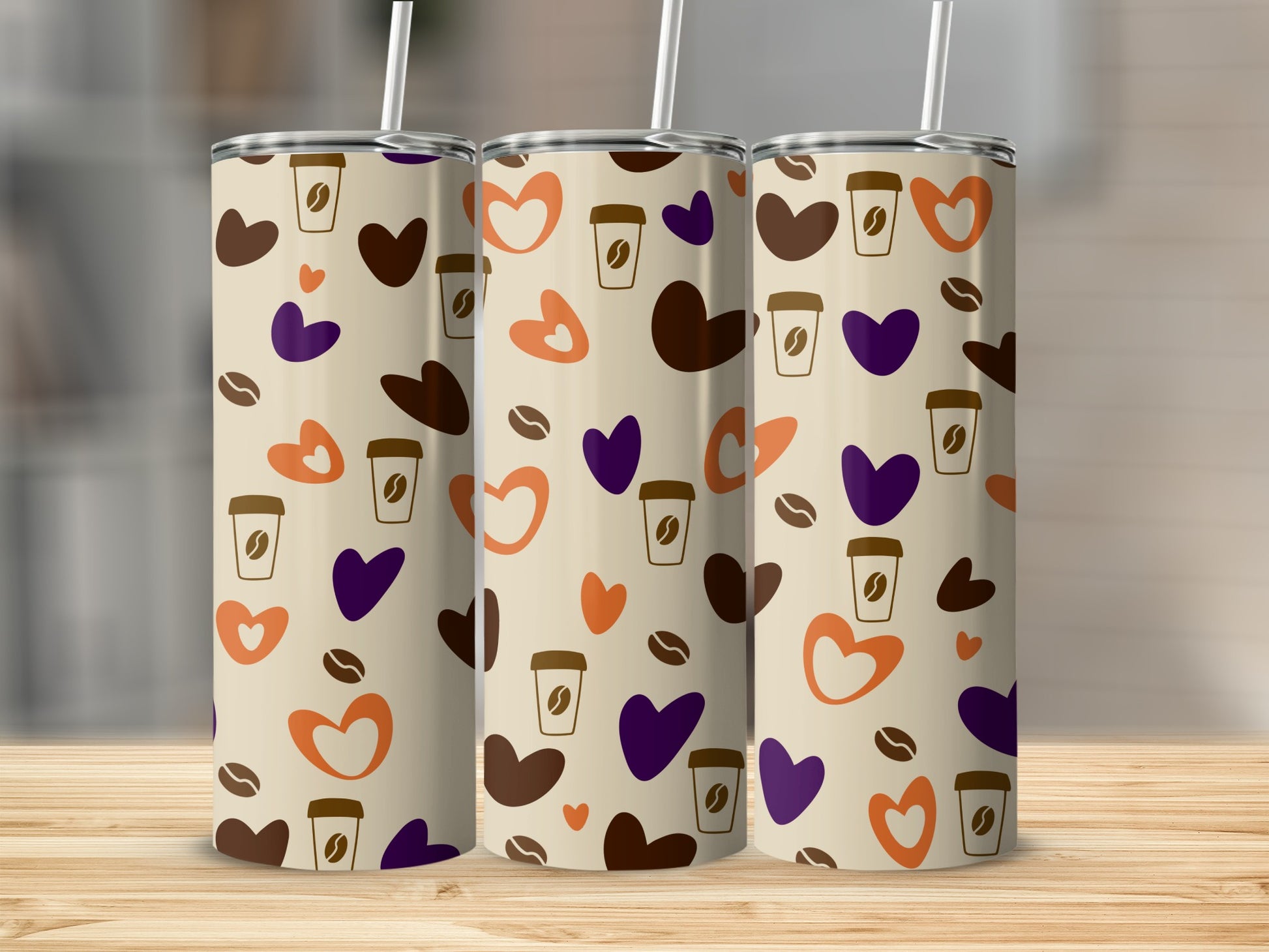 Three tumblers with a repeating pattern of coffee cups and hearts.