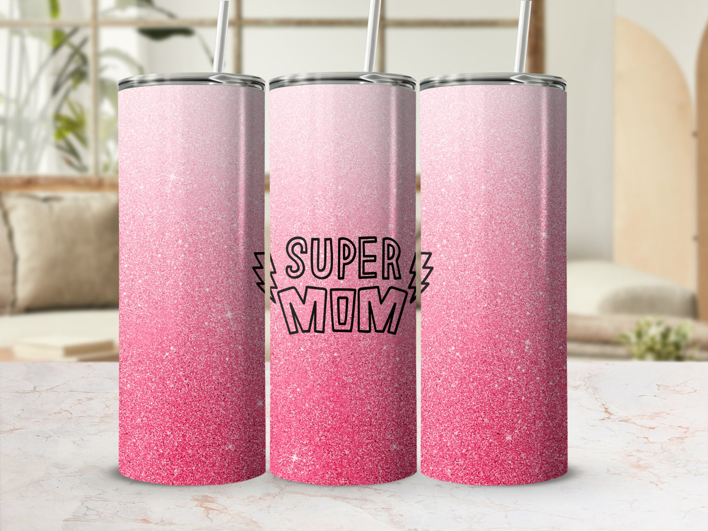 Pink glitter tumbler with "Super Mom" text.