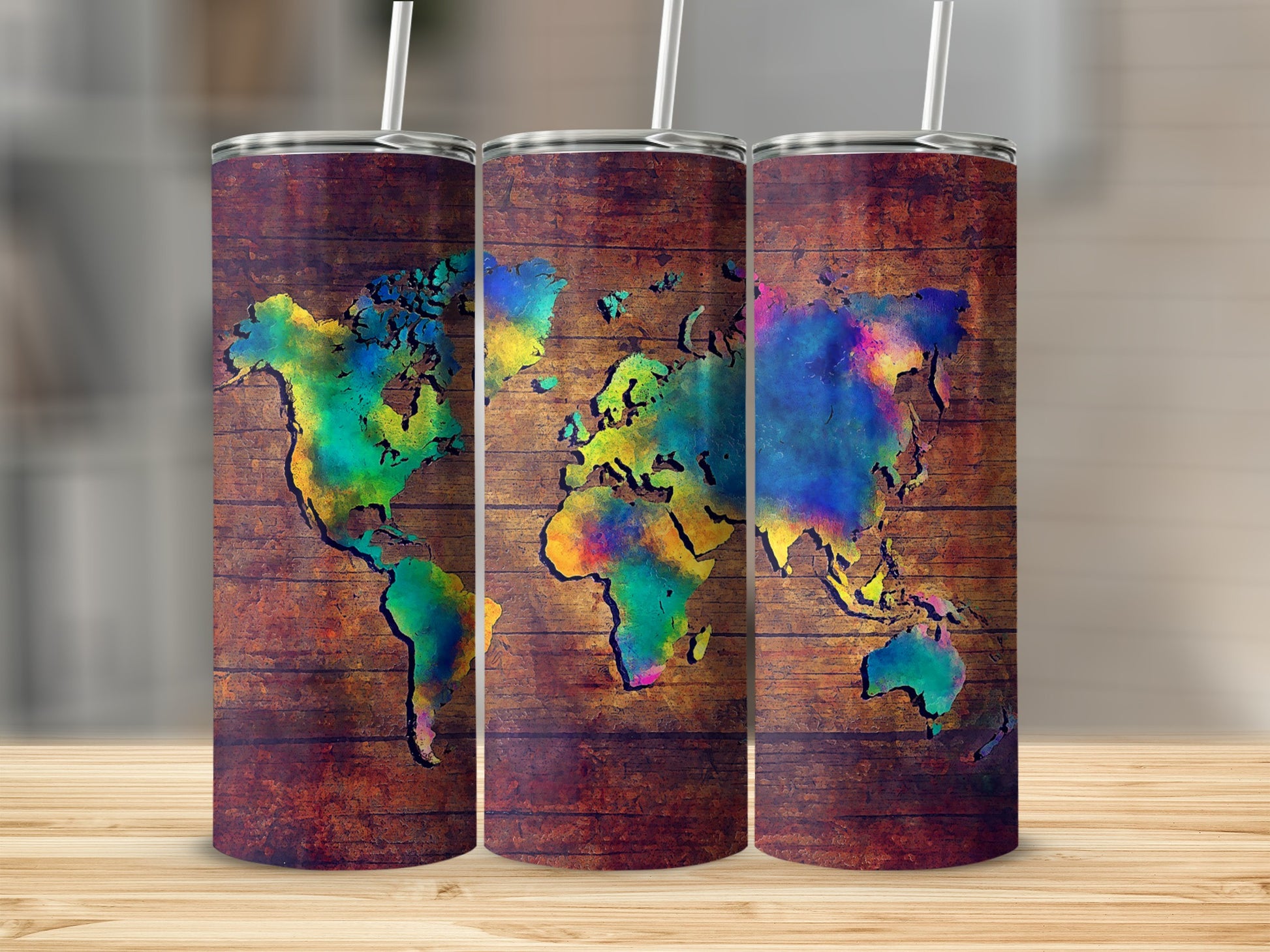 Three tumblers with a colorful world map on wood grain design.