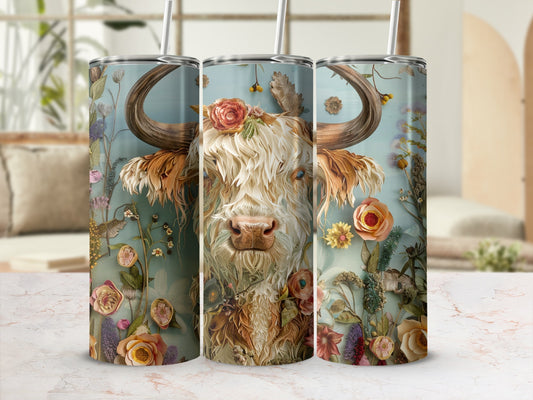 Highland cow portrait with floral accents on a tapered tumbler.