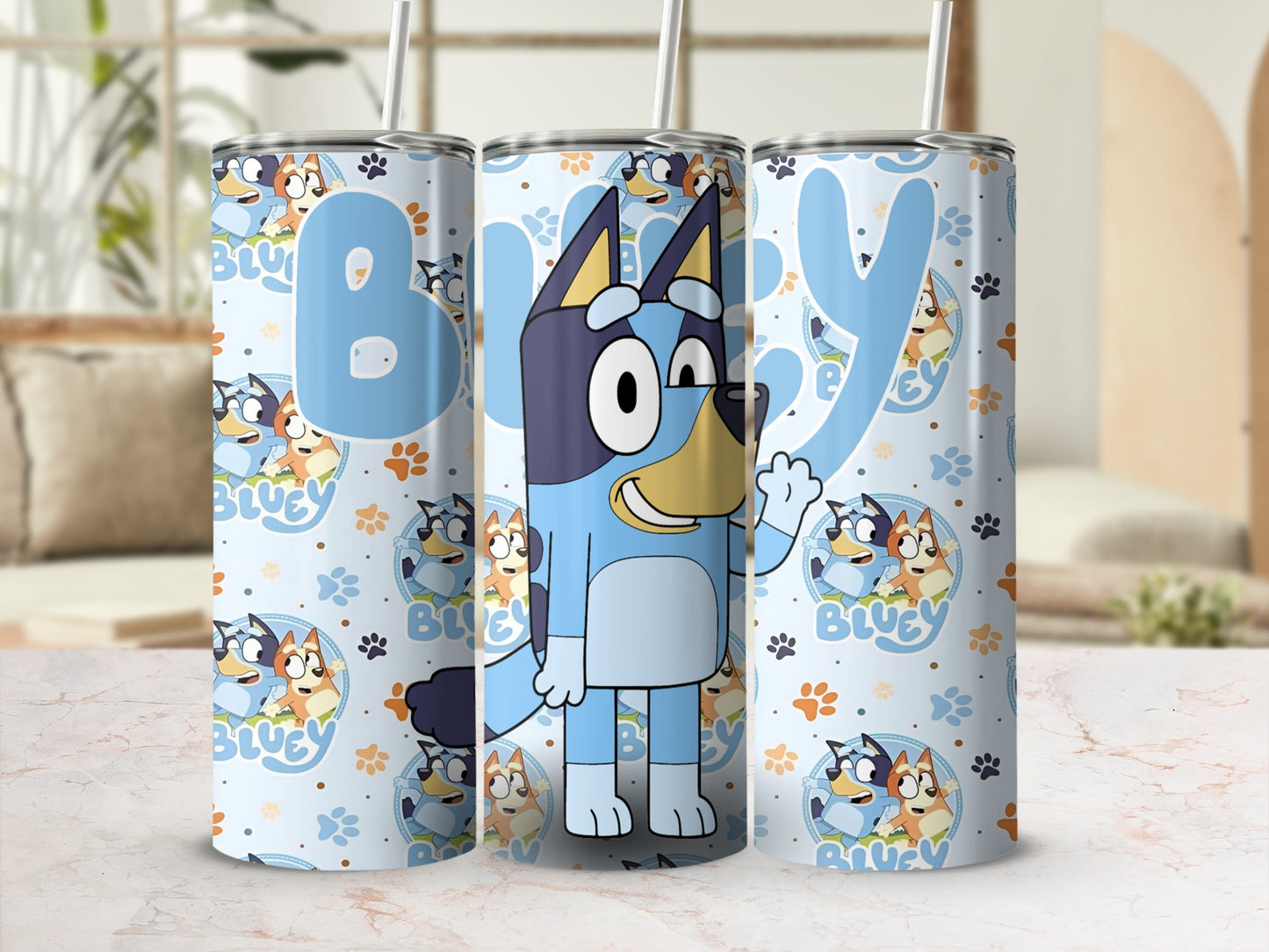 Bluey character tumbler with paw print pattern and blue lettering.